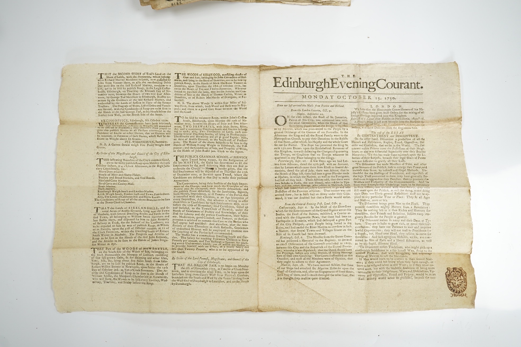 The Edinburgh Evening Courant - 52 various issues, 1742-52. small broadsheet of 4pp. with double column printing; uniformly folded across to 'docket' size (7 x 22cm) Edinburgh: printed for R. Fleming and Company, 1742-52